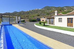 Πισίνα στο ή κοντά στο Casa El Roquito