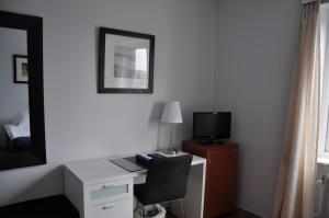 TV o dispositivi per l'intrattenimento presso Strand Hotell