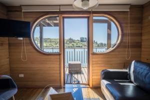 Posezení v ubytování Palafito Loft