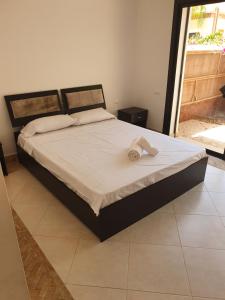 Una cama o camas en una habitación de Superbe villa avec piscine privée 19 fotos más