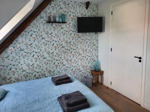 Postel nebo postele na pokoji v ubytování B & B De Tocht