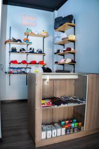 a shelf with shoes on it in a store at HotelSuizaApartamentos in Ipiales