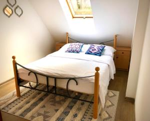 Postel nebo postele na pokoji v ubytování Apartament Natura