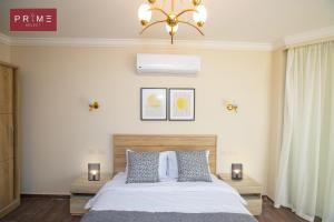 Ένα ή περισσότερα κρεβάτια σε δωμάτιο στο Prime Select Marvel City New Cairo