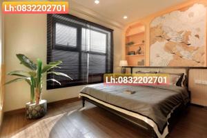 Giường trong phòng chung tại FLC Quy Nhơn Sea View Apartment - CHANH Căn Hộ Hướng Biển