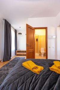 Postel nebo postele na pokoji v ubytování Priedes māja