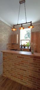 Kuchyň nebo kuchyňský kout v ubytování Guest House Tamta