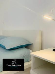 A bed or beds in a room at Dream Holiday Las Americas