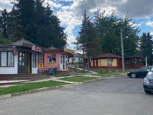The surrounding neighborhood or a neighborhood close to a vendégházakat