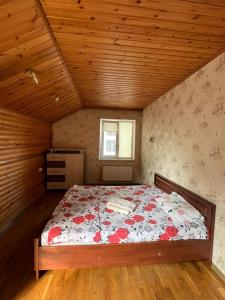 En eller flere senge i et værelse på Casa Centru Chișinău