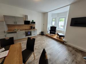 Kuchyň nebo kuchyňský kout v ubytování Ferienwohnungen Appartementhaus Hohe Tauern