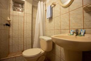 Koupelna v ubytování Hostal La Payacha MachuPicchu + 22 fotografií