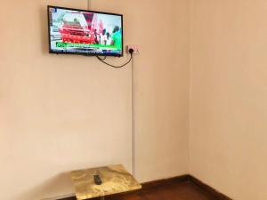 TV o dispositivi per l'intrattenimento presso GRACE LODGE ONITSHA