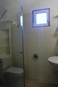 Bilik mandi di Mariana Apartment