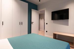 A&N Athens Luxury Apartments - Akadimou的电视和/或娱乐中心