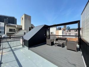 En balkong eller terrasse på FL House 浪花町