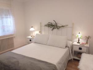 Postel nebo postele na pokoji v ubytování Casa Jardín