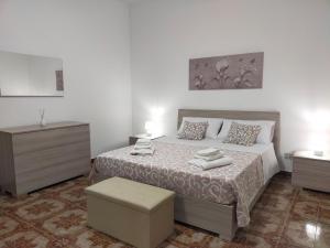 Posteľ alebo postele v izbe v ubytovaní La Coccinella "Casa Vacanza"