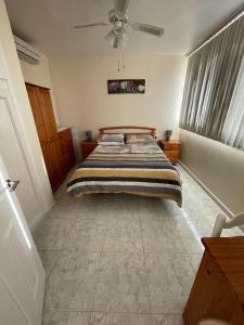 מיטה או מיטות בחדר ב-Arcadia 408