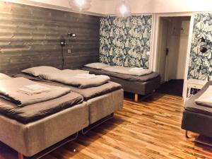 Postel nebo postele na pokoji v ubytování Lapland Lodge