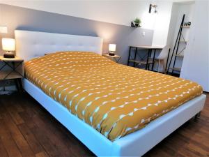 Łóżko lub łóżka w pokoju w obiekcie Appartement moderne entièrement rénové
