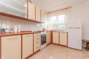 Kuchyň nebo kuchyňský kout v ubytování House Quercus