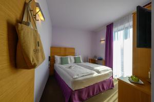 Postel nebo postele na pokoji v ubytování Active & Family Hotel Gioiosa