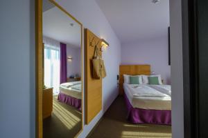 Postel nebo postele na pokoji v ubytování Active & Family Hotel Gioiosa