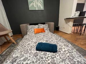 Łóżko lub łóżka w pokoju w obiekcie Mon Palmier Grand Appartement Parking Un-Séjour-à-Part