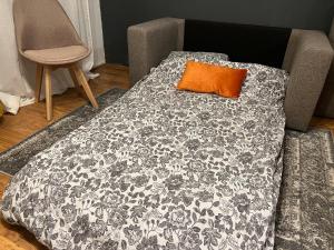 Łóżko lub łóżka w pokoju w obiekcie Mon Palmier Grand Appartement Parking Un-Séjour-à-Part