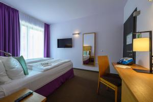 TV a/nebo společenská místnost v ubytování Active & Family Hotel Gioiosa