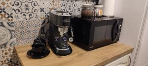 Kuchyňa alebo kuchynka v ubytovaní Retrospekcja - Apartament w centrum