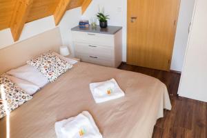 Postel nebo postele na pokoji v ubytování Apartman Apollon Resort Lednice