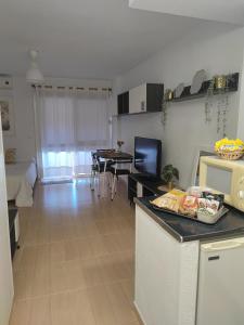A kitchen or kitchenette at Estudio Ed Jupiter Benalmadena