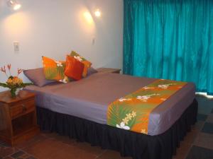 Postel nebo postele na pokoji v ubytování Gecko Lodge Fiji