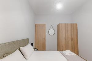 Postel nebo postele na pokoji v ubytování THALASSA ALMYROS APARTMENTS
