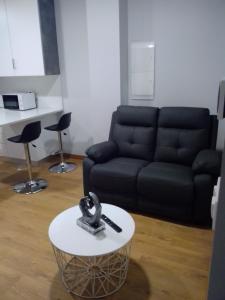 Posezení v ubytování Apartamentos arcade + 4 fotografie