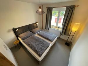 Łóżko lub łóżka w pokoju w obiekcie Apartmány U Medvěda