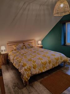 En eller flere senge i et værelse på Gîte 28 court