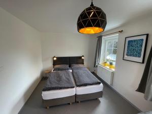 Łóżko lub łóżka w pokoju w obiekcie Apartmány U Medvěda
