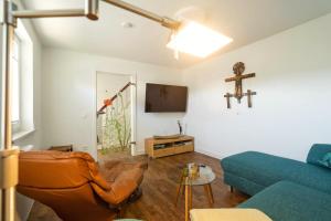 TV a/nebo společenská místnost v ubytování Idas Garten