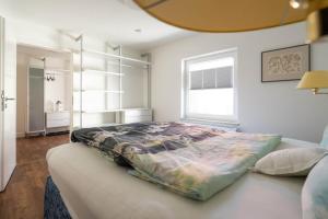 a bedroom with a large bed in a room at Idas Garten in Bad Lauterberg