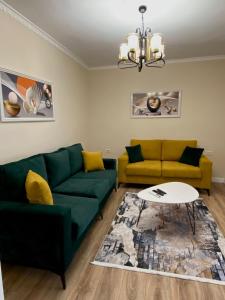 A seating area at Serenity Apartament