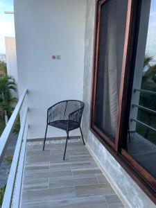 Un balcón o terraza en Hotel Lunazul In Costa Esmeralda
