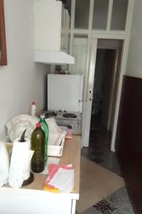 a kitchen with a counter top and a refrigerator at Apartments by the sea Povlja, Brac - 712 in Povlja