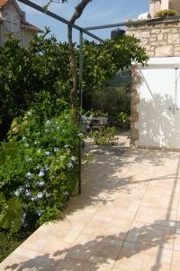 Zahrada ubytování Apartments by the sea Milna, Brac - 735