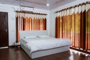 מיטה או מיטות בחדר ב-SB Mount Resort