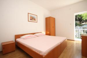 Apartments and rooms by the sea Lucica, Lastovo - 990客房内的一张或多张床位