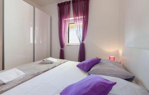 Ένα ή περισσότερα κρεβάτια σε δωμάτιο στο Apartment Pisak 1001d