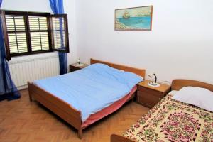 Posteľ alebo postele v izbe v ubytovaní Apartments with a parking space Kraj, Pasman - 696